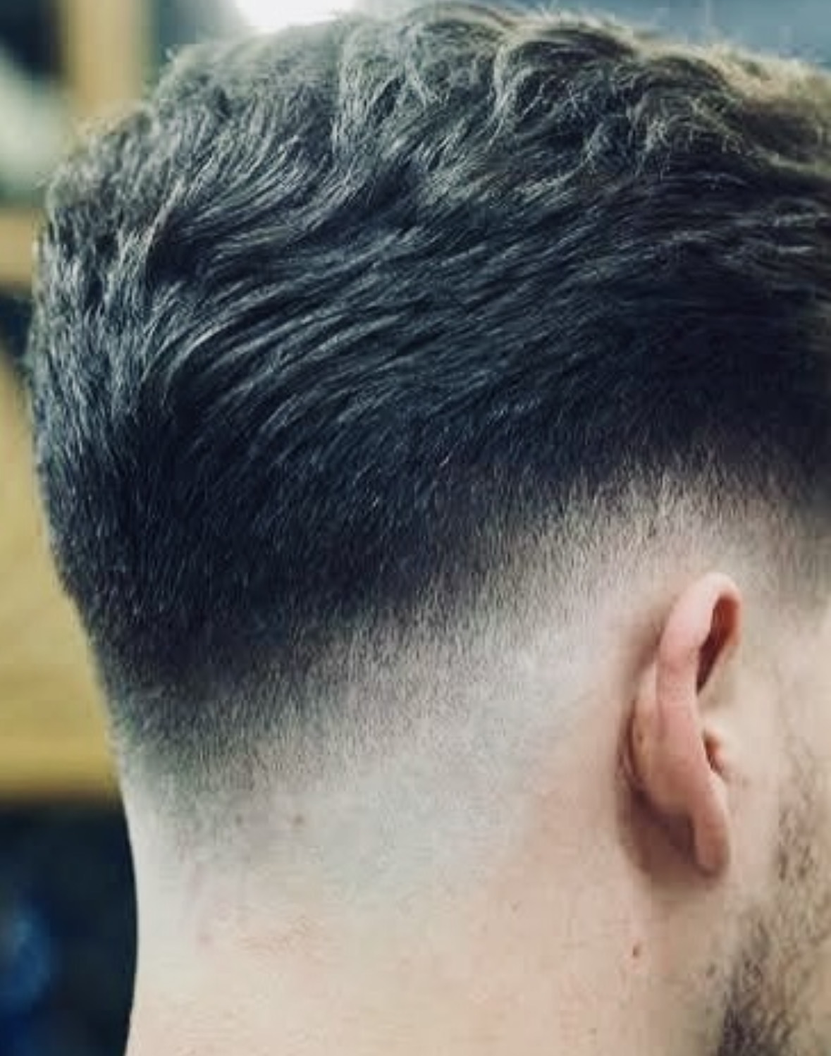 Kort herenkapsel met textuur en skin fade